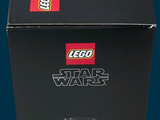 a black box with a lego star wars darth vader figure on it
