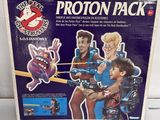 the box of the ghostbuss proton pack is on the table