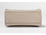 an image of a women ' s wallet case with gold hardware