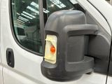 an image of a side view mirror of a van