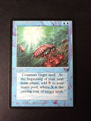a close up of a card with a picture of a bug on it