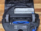 a black box with a blue cord inside of it