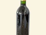 a bottle of wine that has been left on the table