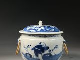 an image of a blue and white bowl with a lid