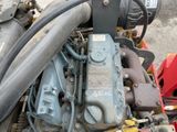 a close up of the engine of a tractor