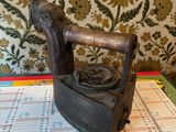 an old iron sitting on top of a calendar