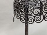 a close up of a table with a lamp on top of it
