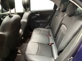 the back seats of a car with a seat belt in a car