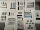 a lot of stamps on the wall of a room
