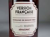 a bottle of wine sitting on a table with a label on it
