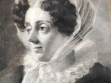 an antique portrait of a woman wearing a white veil