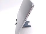 a close up of a laptop computer on a stand