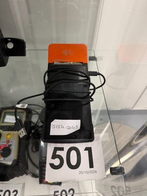 a cell phone with a price tag on it in a display case