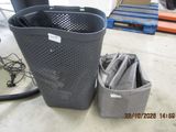 a trash can and a bag on the floor