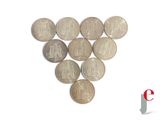a lot of coins arranged in the shape of a heart
