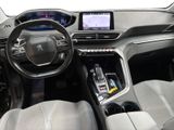 the interior of a car with a steering wheel, dashboard, and dashboard controls