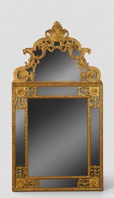 an image of a mirror with a gold frame on a white background