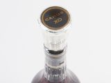 a bottle of liquor that is sitting on a table