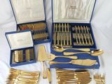 an assortment of silverware including forks, knives and spoons