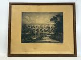 une vieille photo représentant un tableau d'un pont enjambant une rivière