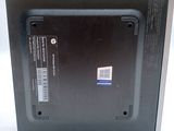 the back of a laptop computer with a sticker on it