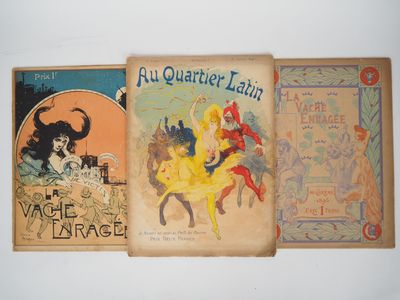three books are lined up on a white surface
