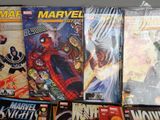 many comic books on display in a store