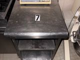an image of a kitchen with a scale on the counter