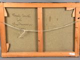 an old wooden frame with writing on it and a rope hanging from the frame