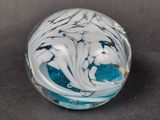 a marble that is sitting on a table