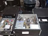 a pile of electronic equipment sitting on top of a pallet