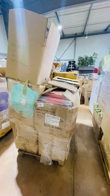 many boxes stacked on top of each other in a warehouse