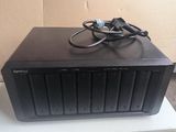 a hard drive on top of a box with a power cord