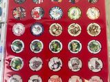 a picture of a red tray with a bunch of magnets on it