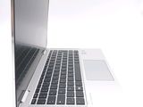 a close up of a laptop computer on a white surface