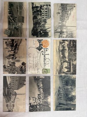 many old postcards that are sitting on a table