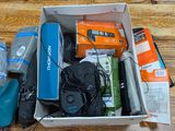 a box full of electronics on a wooden table