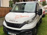 a white van that is parked in the grass