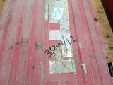 a red table that has some writing on it