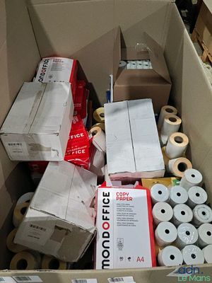 many rolls of toilet paper in a cardboard box
