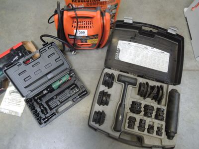 many tools that are laying out on the floor