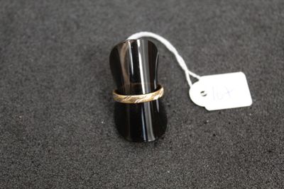a ring that is on top of a black object