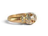 an image of a gold and diamond ring on a white background