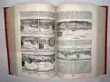 an open book with pictures of a city in it