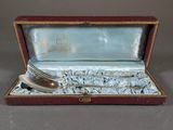 a silverware in a box with a fork and spoon in it