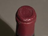 a bottle of wine that is sitting on a table