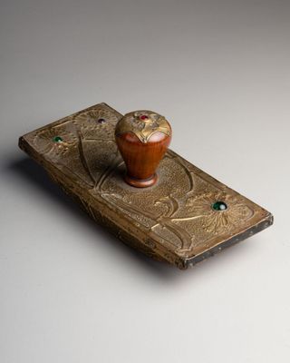 an image of a small wooden box with an owl on top of it