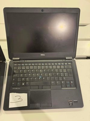 two laptops that are sitting on a table