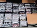 many glasses in the case on the table