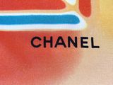 a picture of a picture of a chanel logo on a t - shirt